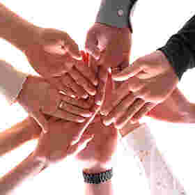 Teamkreis mit Hände-Stapel